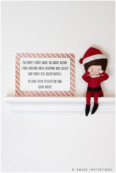 an elf stuffed animal hanging on the wall next to a sign that says, you're sorry i didn't have the night before