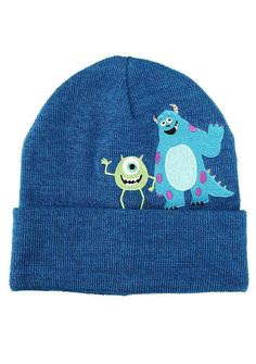 a blue beanie with monsters on it