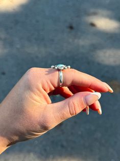 Lone Mountain Turquoise evil eye ring on a thick single band ring shank. This ring is a size 7.25 Adjustable Turquoise Opal Open Ring, Turquoise Larimar Ring As Gift, Turquoise Larimar Ring For Gift, Adjustable Turquoise Larimar Ring, Adjustable Larimar Turquoise Ring, Turquoise Crystal Open Ring For Promise, Turquoise Larimar Ring In Silver, Turquoise Emerald Open Ring For Promise, Handmade Turquoise Larimar Rings