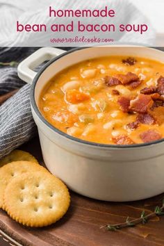 a bowl of homemade bean and bacon soup with crackers