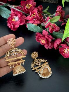 Beautiful gold finished pearl  polki jumkas  for your ethnic party wear dresses. Weight of this pair of earrings: 1 Oz. Product care: Avoid contact with Chemicals such as Perfumes or any Sprays. Prevent the Jewellery from the water. Use Butter Paper or Cotton Cloth to store your Jewellery for a longer Product life. Polki Jhumkas, Butter Paper, Jhumki Earrings, Jhumka Earrings, Jewelry Women, Party Wear Dresses, Jewelry Maker, Star Necklace, Bridal Earrings