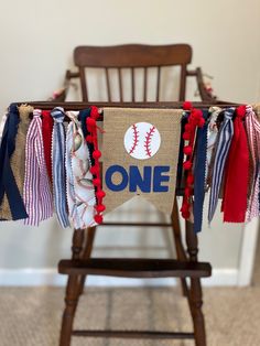 a chair with a one baseball banner on it