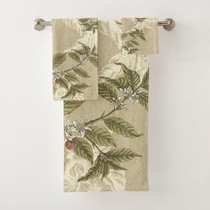 two towels hanging on a towel rack next to each other