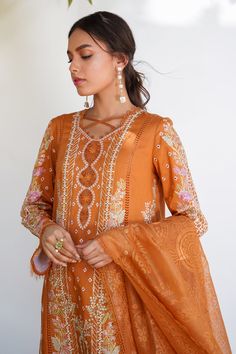 Designer Orange Sets With Chikankari Embroidery, Wedding Churidar With Printed Motifs For Transitional Season, Transitional Wedding Churidar With Printed Motifs, Traditional Printed Motifs Salwar Kameez For Wedding, Traditional Printed Salwar Kameez For Wedding, Traditional Unstitched Wedding Suit With Printed Motifs, Elegant Orange Traditional Wear With Chikankari Embroidery, Unstitched Georgette Churidar With Printed Motifs, Eid Georgette Churidar With Printed Motifs