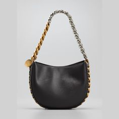 Stella McCartney shoulder bag in faux-leather. Two-tone chain shoulder strap woven onto bag; hanging engraved charm. Detachable, adjustable shoulder strap, 22.6" drop. Open top with snap closure. Interior, one slip pocket. Approx. 6.9"H x 8.5"W x 2.8"D. "Frayme" is made in Italy. Evening Shoulder Bag With Detachable Chain Link Strap, Luxury Everyday Shoulder Bag With Chain Strap, Luxury Shoulder Bag With Chain In Crossbody Style, Luxury Hobo Bag With Chain Strap For Formal Occasions, Luxury Chain Shoulder Bag Crossbody, Luxury Chain Crossbody Shoulder Bag, Luxury Chain Shoulder Crossbody Bag, Luxury Formal Hobo Bag With Chain Strap, Designer Shoulder Bag With Chain Detail