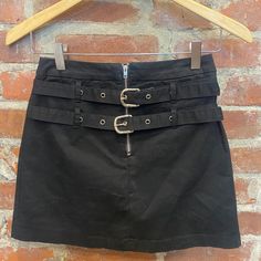 Size 6 Black Carmar Mini Skirt Never Worn, Tag Attached Runs Small- Fits Xs/S Trendy Black Skort With Belt Loops, Black Skort With Belt Loops For Spring, Black Punk Style Belted Bottoms, Spring Black Skort With Belt Loops, Punk Style Black Belted Bottoms, Casual Black Skirt With Belt Loops, Black Mini Skirt With Belt Loops For Night Out, Fitted Black Belted Mini Skirt, Black High Waist Mini Skirt With Belt Loops