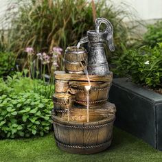 a water fountain made out of wood and metal