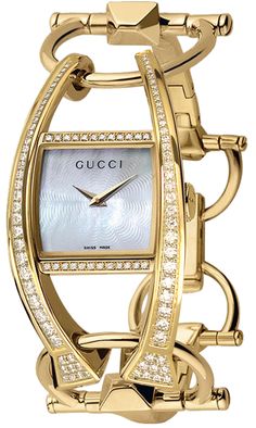 YA123508 GUCCI CHIODO 123 WOMEN'S WATCH Usually ships within 6 months | Click to View In Stock Watches on Sale - Free Overnight Shipping - With Manufacturer Serial Numbers - Swiss Made - Mother of Pearl Guilloche White Dial - 106 Diamonds Set On Case - Battery Operated Quartz Movement - 3 Year Warranty - Guaranteed Authentic - Certificate of Authenticity - Polished Solid 18k Gold Case & Bangle Bracelet - Scratch Resistant Sapphire Crystal - Manufacturer Box & Manual - 30 Meters / 100 Feet Water-Resistant - 21.5mm x 23.5mm = 7/8" x 1" Case - Adjustable Bracelet Will Fit Up To 6 3/8" Wrist - Jewelry Clasp - Free Lifetime Battery Replacement     Also Known As Model # 123508 Cute Watches, Gucci Watch, Wrist Jewelry, Gucci Jewelry, Jewelry Clasps, Gold Case, Beautiful Watches, Women's Watch, Diamond Watch