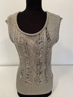 Easy summer crochet sleeveless top from Guess. Silver gray crochet sleeveless pullover scoop neckline casual sheer top ,soft knit material ,lightweight super comfortable to wear ,stretch in the fabric for personal comfort great for any occasion .This knit top pair well with jeans,shorts leggings stretch forward and wear it over your favorite lightweight turtleneck . Conditions is New with tags .Shipped with USPS first  Class Mail .(M-2) Please check the measurements below to ensure your proper f