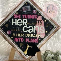 a decorated graduation cap with the words she turned her can't into cans and her dreams into plans