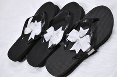 Our black flip flops are perfect for a classic wedding theme. The strap is a simple matte color that will go with just about anything. Our high quality flip flops and are made with high density rubber, with a 14mm sole thickness for maximum cushion & support. The straps are 30% wider than standard flip flops providing a more snug fit. You can purchase a sample pair by clicking here. Everyone's idea of comfort is different and a difference in monitor screens can mean we view colors differentl Wedding Flip Flops For Guests, Flip Flop Favors, Classic Wedding Theme, Nude Flip Flops, Classic Wedding Themes, Navy Flip Flops, Silver Flip Flops, Gold Flip Flops, Wedding Flip Flops