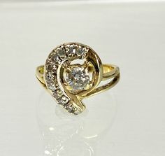 14K Yellow Gold Vintage Estate 1/3 Carat Diamond Swirl Cluster Ring Size 2.75 Ring Size:  2.75 Metal Purity:  14K Metal Type: Yellow Gold Main Stone:  Diamond  Main Stone Size/Carats: 0.31 TCW By Formula Setting Style: Cluster Sizable:  Yes Weight: 2.6g J0043 Prompt FREE Shipping FREE Easy Returns Marquise Cut Rings, 3 Carat Diamond, San Jacinto, Gold Gift, 3 Carat, Fine Rings, Cluster Ring, Rings Statement, Beautiful Earrings