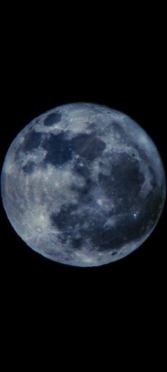 the full moon is seen in the dark sky