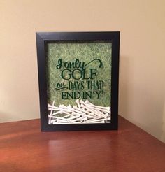 there is a picture frame with some clothes pins in it that says, you only golf on days that end in y