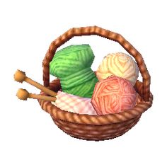 a basket filled with balls of yarn and knitting needles