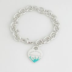 Guaranteed 100% Authentic Return To Tiffany & Co Heart Tag Color Splash Bracelet. Extra Large Length Measures 9" Will Fit A Wrist Up To 7.75” Around. 37 Grams. Heart Is 1" X .81". In 1969 Tiffany & Co Started The "Please Return To Tiffany" Collection By Engraving Unique Serial Numbers On Key Ring Charms So That Should The Owners Every Lose Their Keys Tiffany Would Know Who To Return Them To... Love It!! Teal Box & Ribbon Included. Tiffany Jewelry Bracelet, Accessories Png, Box Ribbon, Return To Tiffany, Heart Tag, Tiffany Jewelry, Tiffany Co Jewelry, Tiffany And Co, Baddie Hairstyles