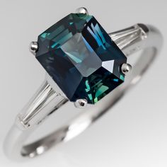 Emerald Cut Green Blue Sapphire Ring Platinum w/ Baguette Diamonds Emerald-cut Sapphire Wedding Ring In Platinum, Emerald-cut Sapphire Diamond Ring In Platinum, Sapphire Color Emerald-cut Diamond Ring In Platinum, Sisters Ring, Exquisite Emerald-cut Sapphire Ring, Blue Emerald-cut Sapphire Ring In Sterling Silver, Wedding Ring Finger, Sapphire Jewellery, Romantic Rings