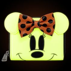 How cute is this Halloween-inspired Ghost Minnie Wallet?! Don't forget to grab the matching backpack! This Loungefly Disney Ghost Minnie Zip-Around Wallet features an applique bow and ears, with embroidered and printed details. It even glows in the dark! DETAIL Style #: WDWA1753 Material: Faux leather Measurements: W 5" x H 4" Wipe clean Imported Disney Ghost, Dark Cosplay, Pastel Backpack, Billy Kid, Element Symbols, Coordinating Patterns, Dark Material, Geek Fashion, Loungefly Disney