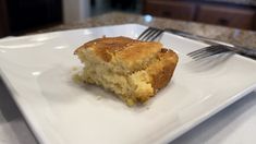 a piece of cake sitting on top of a white plate