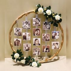 a wooden circle with pictures and flowers on it, surrounded by photos in the center