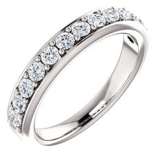 a white gold ring with rows of diamonds