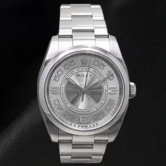 Absolutely gorgeous Rolex. Very fine steel watch. Perfect craftsmanship Rolex is well known for. In mint condition (Pre-owned). Rolex Oyster Perpetual Series Gender : Men's Watch/Unisex Movement : Fully Automatic movement winds itself when worn. Case : Steel Bracelet : Steel Dial : Silver Arabic Dial Bezel : Plain Bezel Case Size : 36mm Condition : Mint. Looks brand new, well polished, no scratches etc. Service : It has been fully serviced and would work well for a few years before requiring service again. Wrist Size : 7.5”. Can adjust the wrist size. Extra links available for an additional cost. Packaging : Comes complete with Appraisal, booklet, tag etc. Silver Platinum Watch With Chronometer, Silver Platinum Chronometer Watch, Platinum Silver Watches With Subdials, Modern Platinum Watch With Polished Finish, Modern Platinum Watches With Polished Finish, Rolex Oyster Perpetual 36mm, Rolex Oyster Perpetual, Rolex Oyster, Pre Owned Rolex