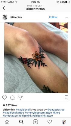 a person with a flower tattoo on their arm and leg, laying down next to each other