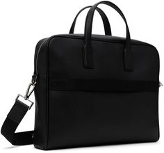 Saffiano leather briefcase in black. · Twin carry handles · Adjustable and detachable logo-woven crossbody strap · Logo printed at face · Zip pocket · Logo-woven luggage strap at back face · Zip closure · Patch pockets at interior · Laptop compartment · Plain-woven lining · Logo-engraved silver-tone hardware · H12.5 x W15 x D3.5 Supplier color: Black Modern Business Satchel With Adjustable Handle, Modern Black Briefcase With Adjustable Strap, Business Briefcase With Adjustable Double Handle, Black Satchel Briefcase With Adjustable Handle, Designer Black Satchel With Adjustable Handle, Business Satchel Briefcase With Adjustable Handle, Black Briefcase With Detachable Handle For Business Trips, Rectangular Briefcase With Adjustable Handle For Business, Business Briefcase With Adjustable Handle