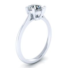 a white gold engagement ring with an oval cut diamond