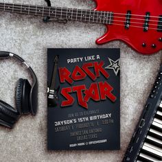 a rock star birthday party with headphones, guitar and music equipment on the floor