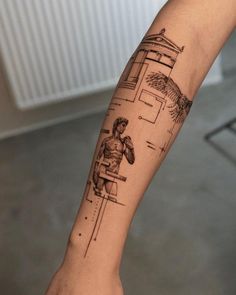 a person with a tattoo on their arm