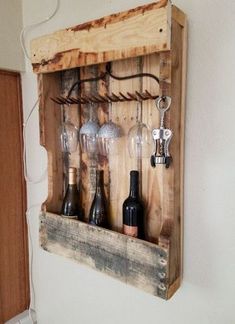 a wooden wine rack with bottles and corks