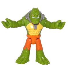 the action figure is green and orange