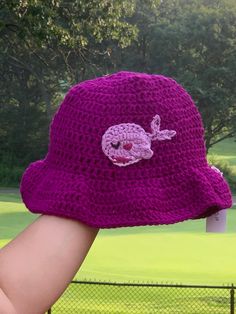 Cute BTS whalien crocheted bucket hat made with acrylic yarn for the hat and cotton yarn for the whalien applique. Fits the average medium adult head size. Purple Crochet Beanie For The Beach, Purple Crochet Beanie For Beach, Cute Cotton Crochet Hat For The Beach, Handmade Purple Crochet Hat With Curved Brim, Purple Crochet Yarn Bucket Hat, Purple Yarn Crochet Bucket Hat, Summer Crochet Purple Hats, Summer Purple Crochet Hats, Casual Purple Crochet Bucket Hat