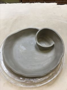 two bowls sitting on top of each other