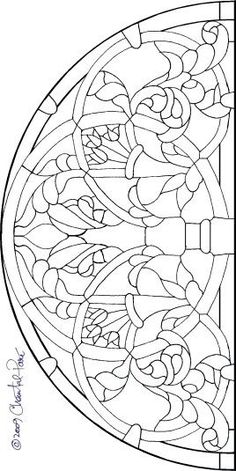 an image of a stained glass window in the shape of a circle with flowers on it