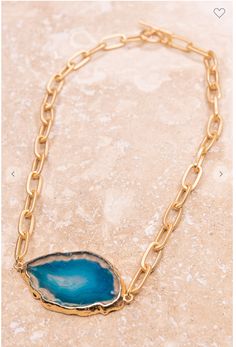 This dreamy Brushed Gold link necklace features an agate stone in blue. Chain has a toggle closure. Please expect some variation in color/texture due to natural material. Chain : 18" long Stone: varies 1-2" wide 1-11/2" long Blue Teardrop Necklace With Large Stone, Agate Jewelry With Adjustable Chain, Blue Pendant Chain Necklace With Adjustable Chain, Adjustable Blue Agate Necklaces, Adjustable Blue Agate Necklace, Blue Agate Jewelry With Large Stone, Agate Stone Necklace, Blue Stone Pendant, Gold Link Necklace