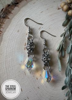 Swarovski Orc Weave Earrings | Etsy Silver Metal Teardrop Earrings Wire Wrapped, Silver Metal Wire Wrapped Teardrop Earrings, Silver Wire Wrapped Metal Teardrop Earrings, Hypoallergenic Metal Crystal Earrings, Hypoallergenic Silver Crystal Earrings, Silver Wire Wrapped Teardrop Crystal Earrings, Teardrop Metal Crystal Earrings For Gifts, Silver Teardrop Wire Wrapped Crystal Earrings, Hypoallergenic Metal Drop Crystal Earrings