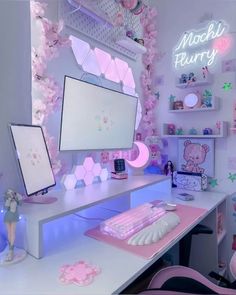 a desk with a computer monitor, keyboard and mouse on it in a pink room