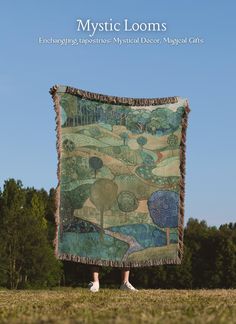 the cover of mystic looms magazine shows a woman standing in front of a tapestry