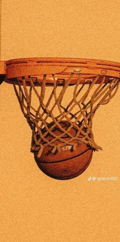 a basketball going through the rim of a basket