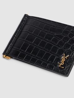 Height: 8.5cm Width: 11.5cm Depth: 1cm. Front metal logo. All over croc embossed pattern placement may vary. Six internal card slots. One internal metal bill clip Luxury Formal Wallets With Metal Logo, Slides Slippers, Embossed Pattern, Clip Wallet, Crossbody Messenger Bag, Work Bags, Sports Accessories, Metal Logo, Toiletry Bags