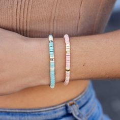 Don’t even think about heading to the beach without slipping on our Sealife Stretch Bracelet! This easy-on-and-off style comes in two stunning hues—a sand-inspired pink and sea-inspired turquoise—with pops of white and silver or gold for an eye-catching effect. - Sand: brass base with gold plating & synthetic howlite beads- Total length of bracelet: 6.75 inches- Because jewelry products are handcrafted by artisans, dimensions may vary from piece to piece Pura Vida Necklace, Fall Style Guide, Sup Accessories, Pura Vida Bracelets, Sea Inspired, White Bracelets, Sealife, Acrylic Beads, Autumn Fashion Women