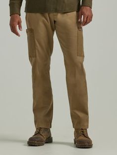 WHERE STYLE MEETS FUNCTION Combining utilitarian details with a tapered cut for extra style, the Men's Athletic Fit Damien Cargo Pant is bound to become a favorite. It comes with a pull-on drawstring waist, zippered cargo pockets with ripstop fabric and extra compartments, flap back pockets, and hip pockets. It fits roomier above the knee and tapered below for more of a tailored look. Best of all, these cargo pants are crafted from a hardy cotton blend with just a hint of stretch for comfort. Rugged Straight Leg Bottoms With Cargo Pockets, Rugged Straight Leg Bottoms With Patch Pockets, Casual Work Pants With Belt Loops For Outdoor, Casual Bottoms With Patch Pockets For Outdoor Work, Utility Cargo Pants With Welt Pockets For Outdoor, Outdoor Khaki Cotton Cargo Jeans, Midweight Cargo Pants With Side Pockets For Outdoor, Functional 4-way Stretch Cargo Pants For Outdoor, Non-stretch Khaki Cargo Pants With Side Pockets