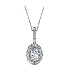 This delicate pendant features one oval-shaped diamond that is approximately 0.23-carat total weight ( 5mm x 3mm) encircled by a halo of perfectly matched 13 brilliant round diamonds in about 0.12-carat total weight. The pendant is measuring at 14 mm in length and 6.2 mm in width. Our clients love it! Experience the difference in person! Product details: Center Gemstone Type: NATURAL DIAMOND Center Gemstone Color: WHITE Center Gemstone Shape: OVAL Center Diamond Carat Weight: 0.23 Metal: 18K Whi Halo 1, Delicate Pendant, Gold Chain Jewelry, American Diamond, 3 Carat, Halo Diamond, Gemstone Colors, Diamond White, Round Diamonds