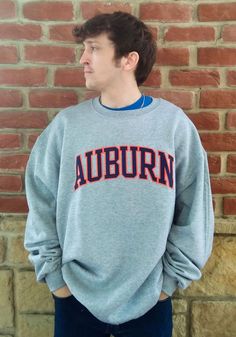 Champion Auburn Tigers Mens Grey Powerblend Tackle Twill Long Sleeve Crew Sweatshirt - 14754790 Collegiate Crew Sweatshirt With Ribbed Cuffs, Collegiate Style Crew Sweatshirt With Ribbed Cuffs, Collegiate Long Sleeve Sweats For College, Collegiate Winter Sweatshirt With Team Logo, Collegiate Long Sleeve Sweatshirt With Team Logo, Fall Varsity Sweatshirt With Team Logo, Varsity Sweats With Ribbed Cuffs For Sports, Collegiate Sweats For College Sports Season, Sporty College Sweatshirt With Team Logo