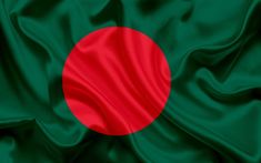 the national flag of bangladesh is depicted in this close - up photo, with silky folds