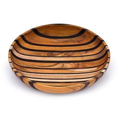 a wooden bowl with black stripes on it