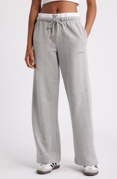 Be relaxation ready in these wide-leg sweatpants featuring a boxer-inspired trim at the waist and a comfy cotton-blend feel. 28 1/2" inseam; 23" leg opening; 11" front rise; 14 1/2" back rise (size Medium) Exclusive retailer Elastic/drawstring waist Side-seam pockets; back patch pocket 90% cotton, 10% polyester Machine wash, dry flat Imported