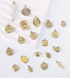 ❥ ❥COUPON CODE:FREES50, free shipping for $50, please fill in the discount code at payment. ❥❥We offer a variety of gold-colored stainless steel pendants with different designs. For detailed views of each item, please visit our store, where you can find individual links for each pendant. ❥❥Stainless steel accessories are loved by many for their durability and stylish look. In order to maintain its luster and extend its service life, you should pay attention to the following points: ❥Avoid chemical corrosion: Stainless steel accessories should avoid contact with acid, alkali and salt substances, which may corrode the jewelry surface. ❥Physical protection: When carrying heavy objects or performing activities that may cause the ornaments to knock against or squeeze, the ornaments should be re Trendy Gold Charms Nickel Free, Gold Jewelry With Star Charm For Valentine's Day, Valentine's Day Gold Jewelry With Star Charm, Gold Stainless Steel Jewelry With Star Charm, Valentine's Day Gold Star Charm Jewelry, Yellow Gold Star-shaped Jewelry With Charms, 14k Gold-filled Star Charm Jewelry, Yellow Gold-plated Star Charm Jewelry, Yellow Gold-plated Dangling Charms